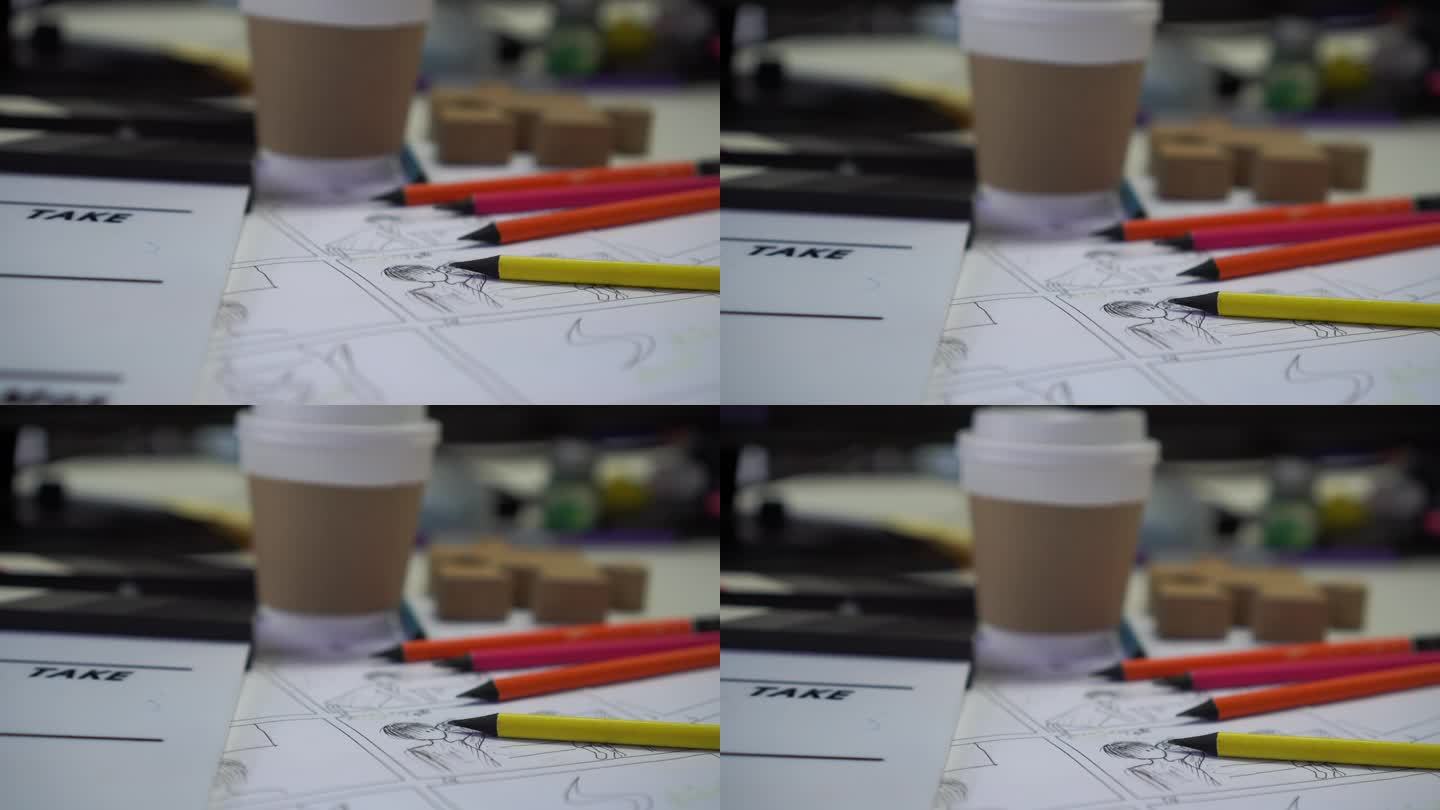 电影电影分镜的创意绘制，展示脚本制作中的视频前期制作过程。在工作室用纸杯咖啡和石板设计拍摄场景布局。