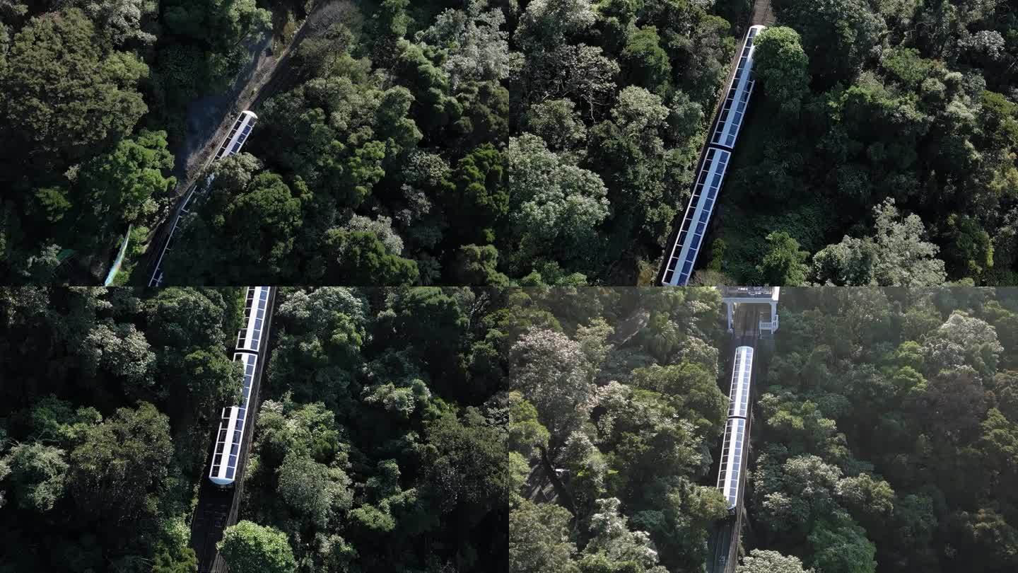 空中跟踪拍摄的电车行驶到山顶在香港