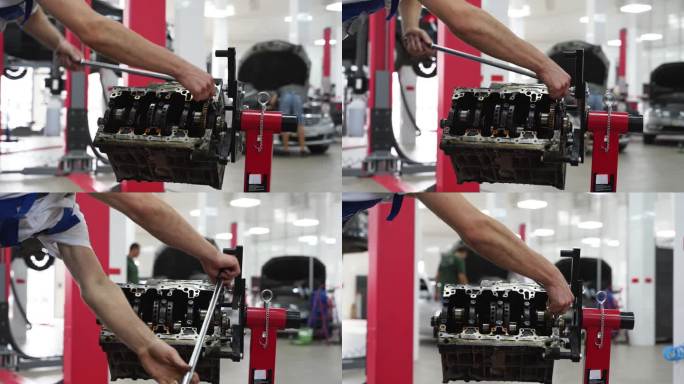 汽车修理工在现代化的车间里拆卸发动机机体，从汽缸上拆下曲轴，进行汽车修理。专业服务程序，内燃大修，发