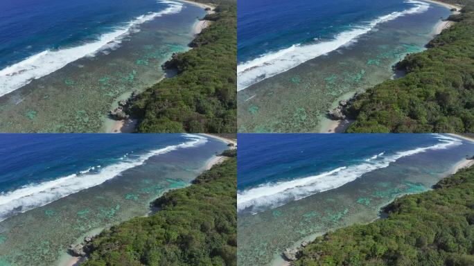 汤加、波利尼西亚。由绿色海岸线和海滩鸟瞰珊瑚礁和南太平洋海浪