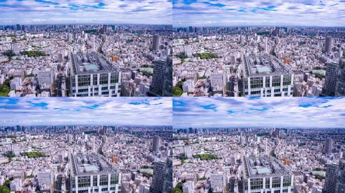 高宽倾斜延时东京城市天际线鸟瞰图与通过云在一个充满活力的一天
