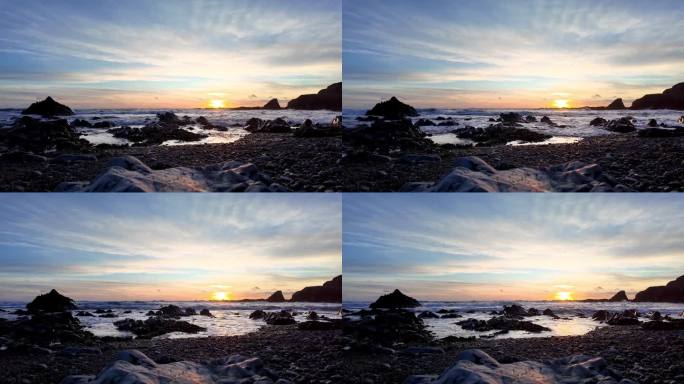缓慢的波浪填满岩石池晚冬的下午，就在日落之前，爱尔兰沃特福德铜海岸
