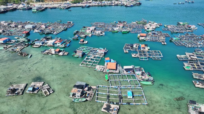 4k海南陵水疍家鱼排玻璃海海湾出海口航拍