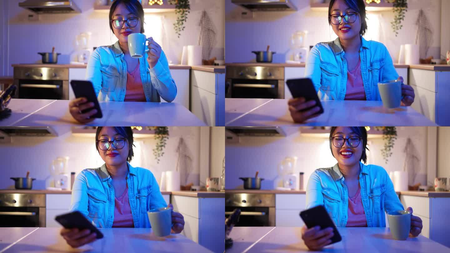 年轻的亚洲女性在家里使用智能手机