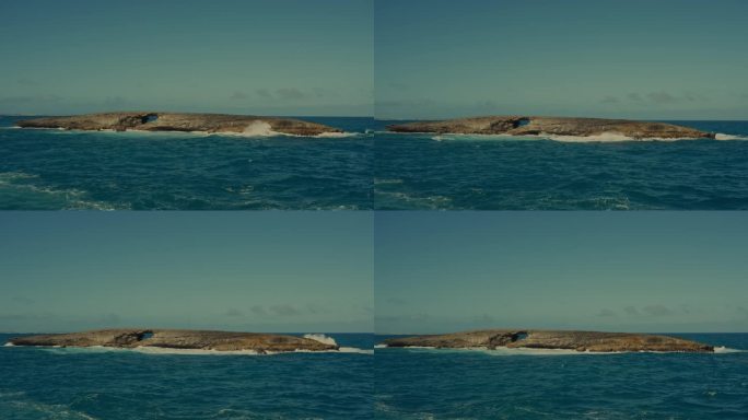 太平洋的海浪追逐着这个岩石荒凉的岛屿的海岸，它自己的天然石桥是在夏威夷多年的侵蚀下形成的