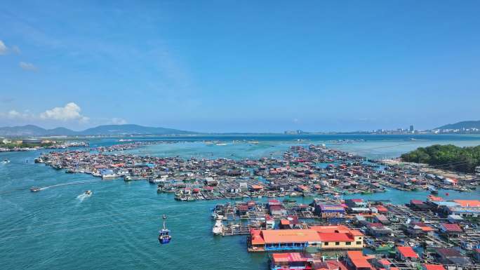 4k海南陵水疍家鱼排玻璃海海湾出海口航拍