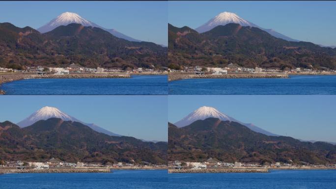 湛蓝的天空和美丽的阳光照在海上和富士山