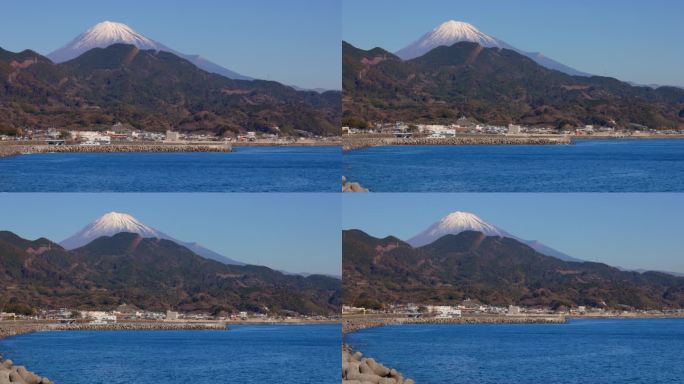 湛蓝的天空和美丽的阳光照在海上和富士山
