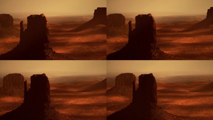 前景中有岩石形成的沙漠景象