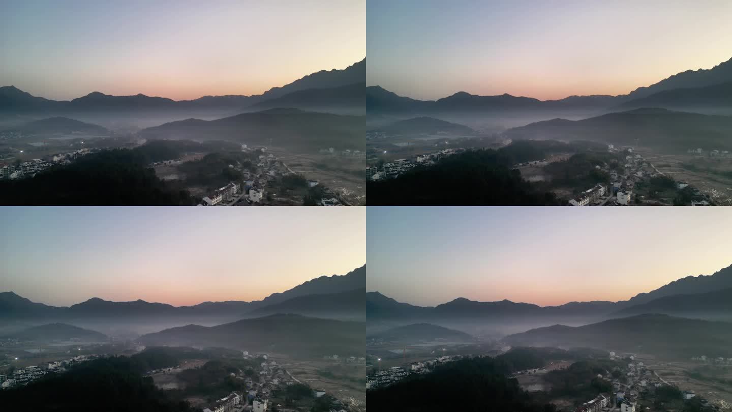 清晨的山下村落云雾缭绕