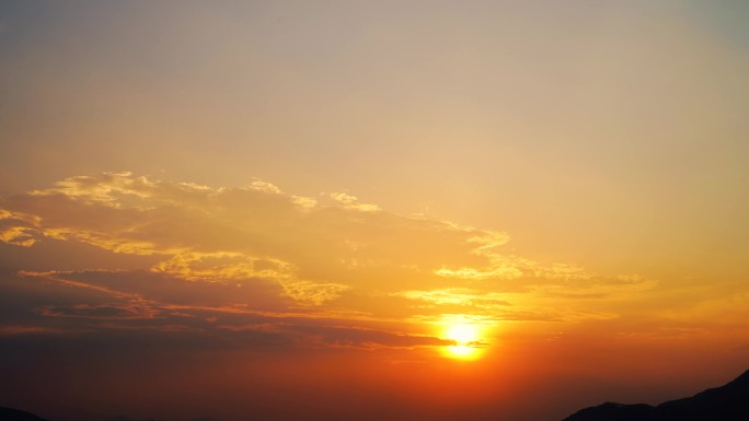 山峰阳光夕阳延时日落黄昏太阳云朵天空晚霞