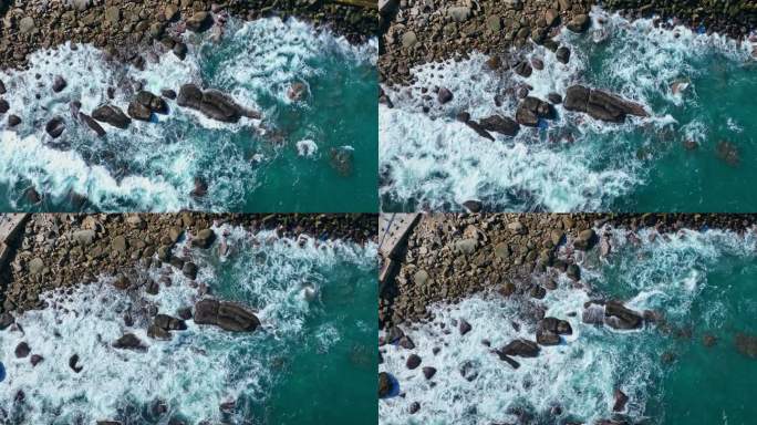 4k海南海岸线大海拍打礁石升格慢动作航拍