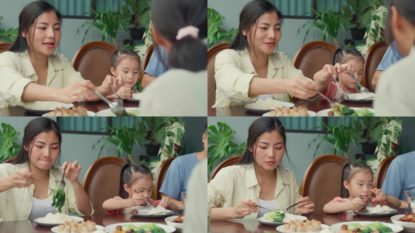Closeup of Asian family eating chinese food and ha