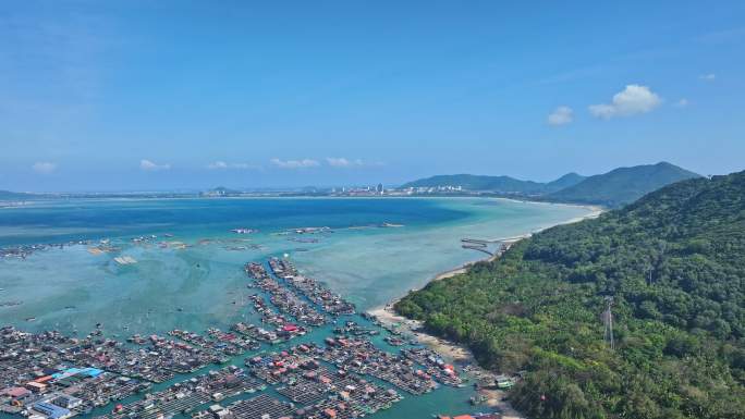 4k海南陵水疍家鱼排玻璃海海湾出海口航拍