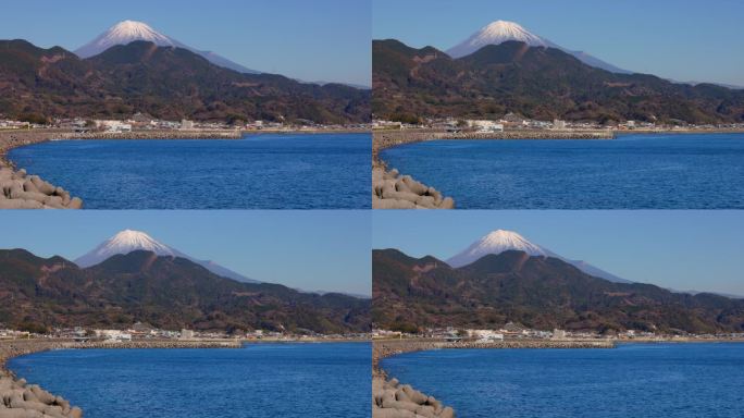 湛蓝的天空和美丽的阳光照在海上和富士山