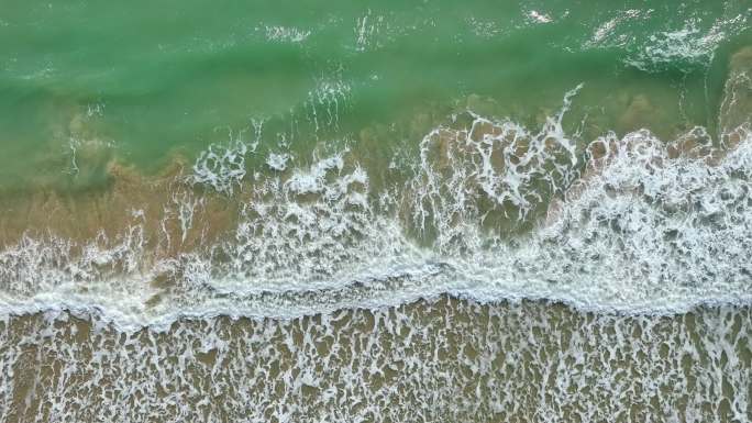 海南海岸线海浪拍打沙滩升格航拍旅拍素材