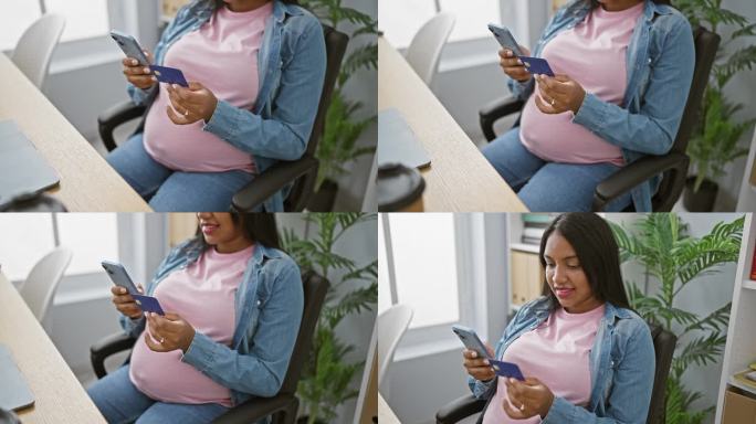 微笑的年轻孕妇，一名商业工作者，在办公室愉快地使用她的智能手机和信用卡
