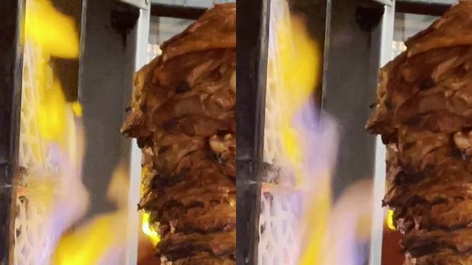 墨西哥马萨特兰市中心的一家露天餐厅里，烤肉和牛肉被切成薄片