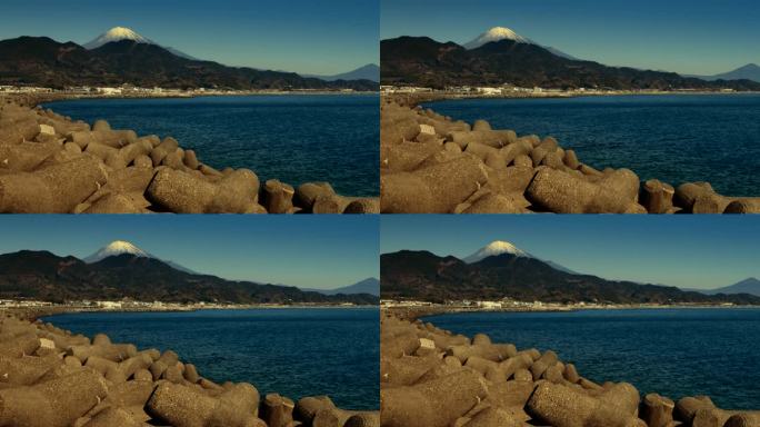 湛蓝的天空和美丽的阳光照在海上和富士山