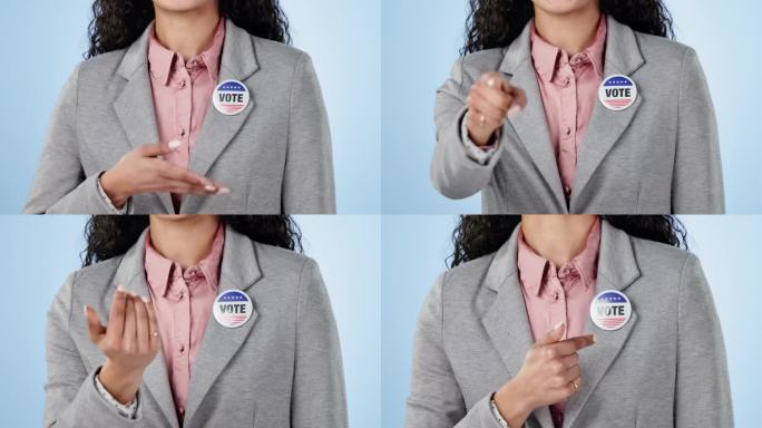 一名妇女在演播室里参加投票活动，她的徽章和手显示了她对政府支持的选择。政治，投票登记和决策，政治家与