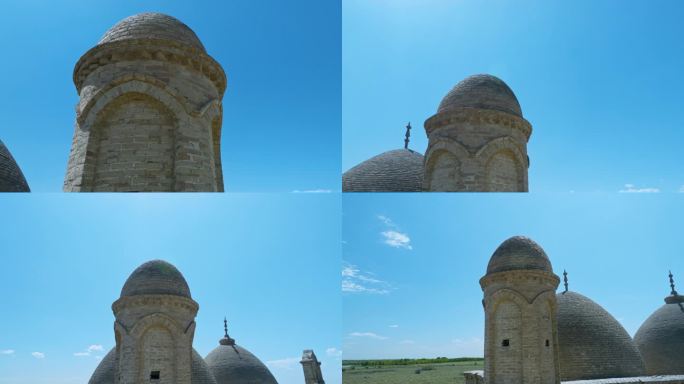 哈萨克斯坦阿利斯坦巴布陵墓正面的砖制尖塔。无人机回拉轨道