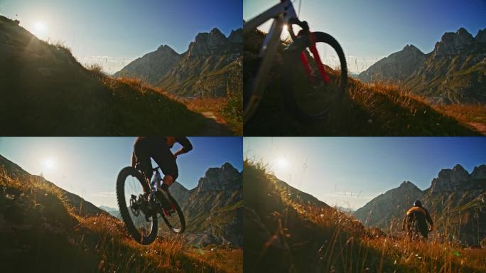 在晴朗的日子里，骑自行车的人在落基山脉和蓝天的草地上跳跃