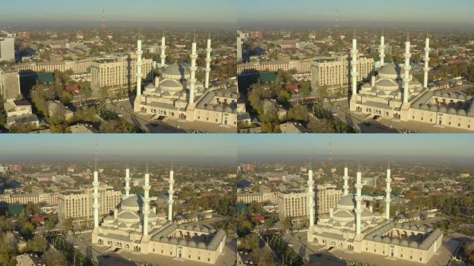比什凯克的主要景点中央清真寺的侧面飞行。以伊玛目萨拉赫西命名的中亚标志性伊斯兰建筑。