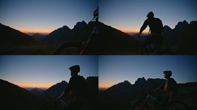 黄昏时分，疲惫的男性骑自行车的人坐在自行车上，面对着山脉和清澈的蓝天