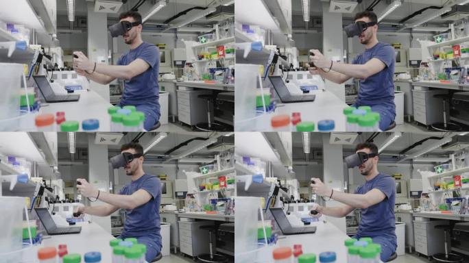 男科学家在实验室里使用虚拟现实眼镜的原型