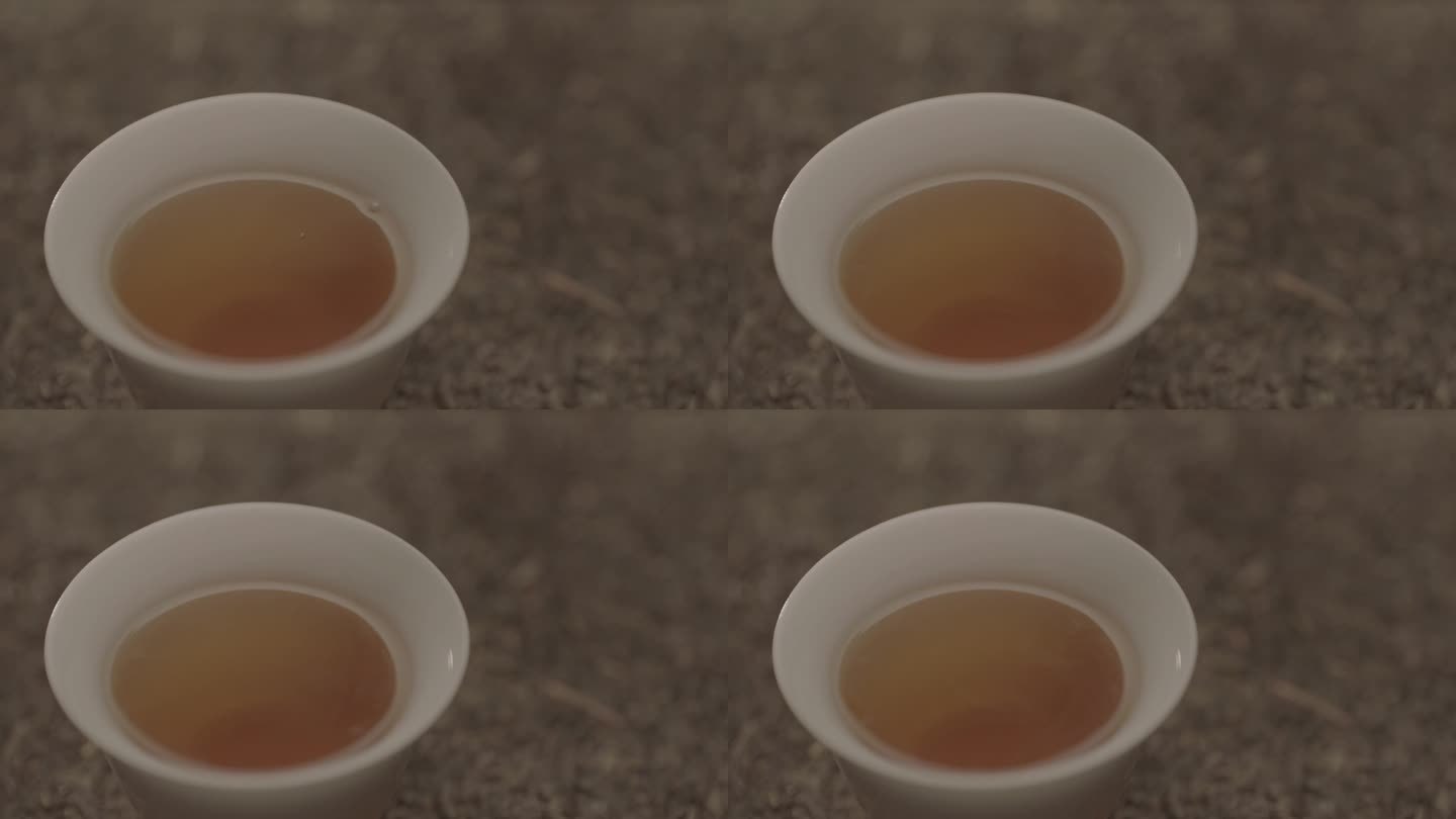 水杯里倒入黑茶茶水