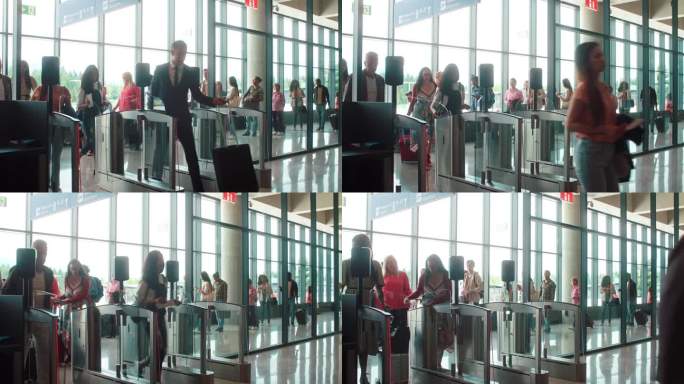 多民族游客在机场安检处使用自助扫描登机牌入境