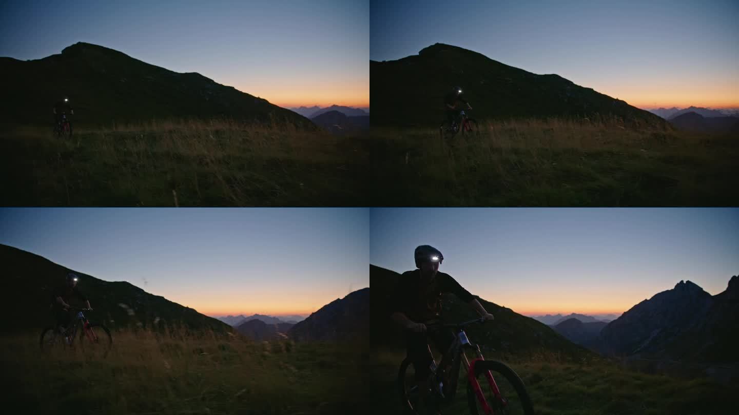 SLO MO坚定的男性骑手骑自行车对山和清澈的蓝天在黄昏