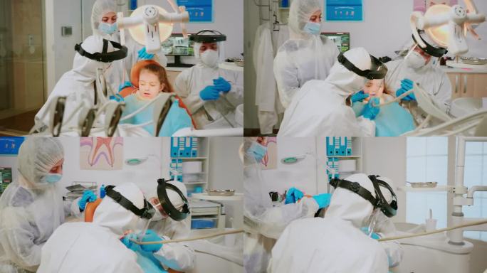穿着防护服的正畸医生在牙科诊所给小孩钻牙