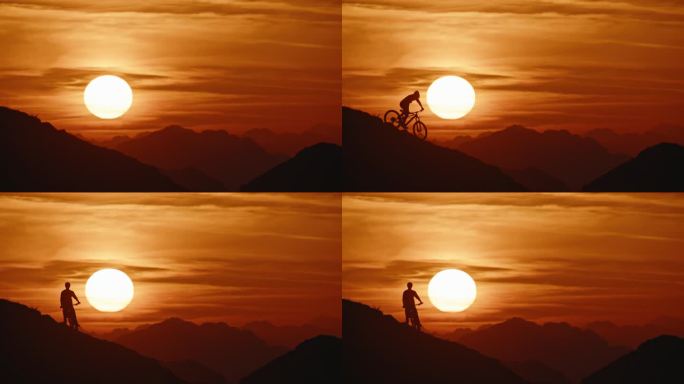 在日落时，运动员骑自行车下山对抗戏剧性的天空的锁定镜头