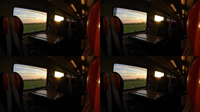 镜头光晕:一个美丽的早晨，一位女士坐在火车上穿越乡村