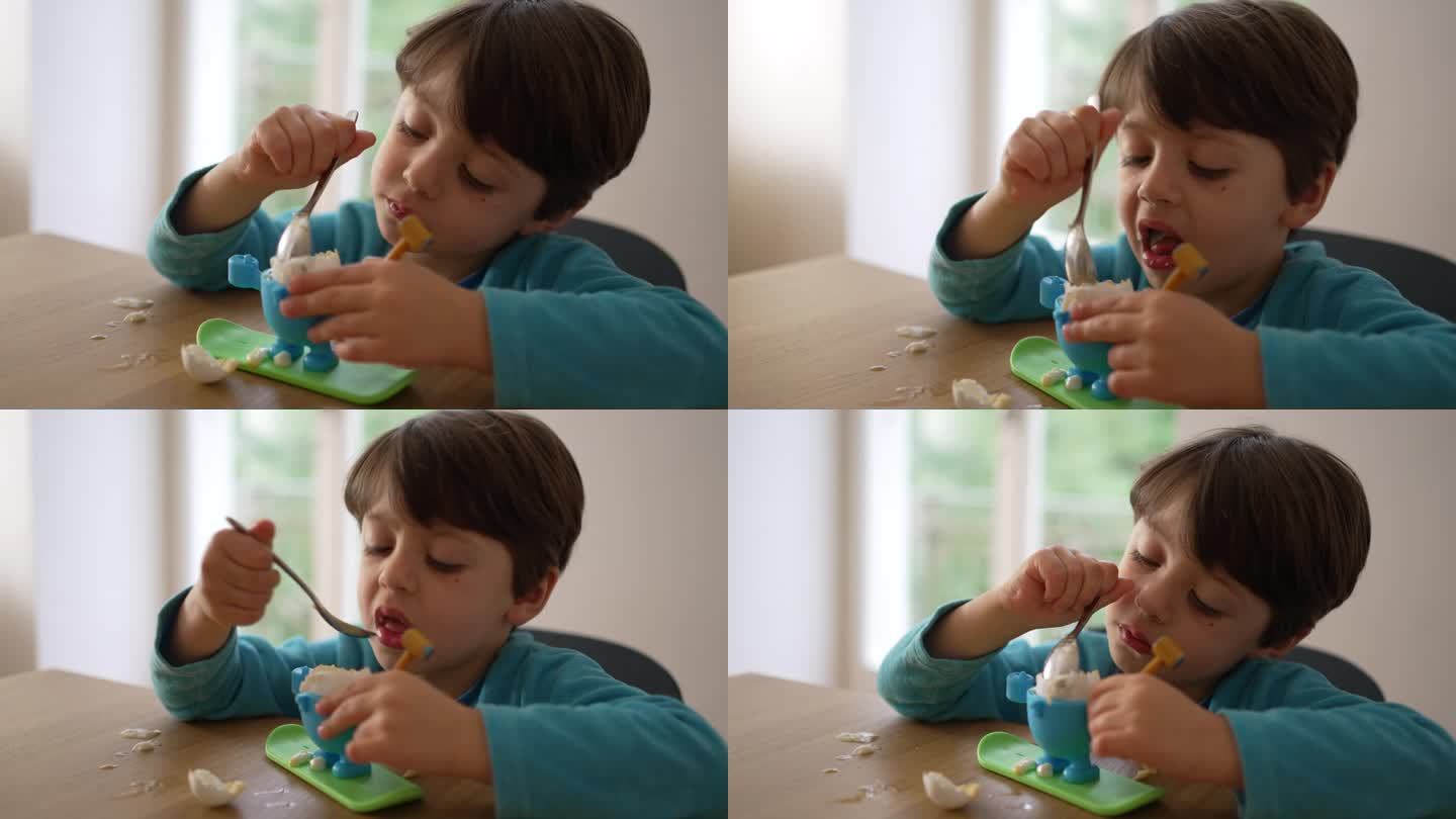 专心用餐，小男孩精致地吃着溏心蛋，专心地品尝早餐