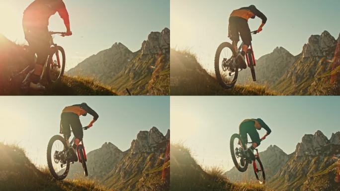 超级慢动作时间扭曲效果男性山地自行车跳跃与自行车越过草坡对田园诗般的落基山脉在阳光明媚的一天