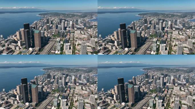 西雅图市中心摩天大楼俯瞰普吉特海湾的广角鸟瞰图。