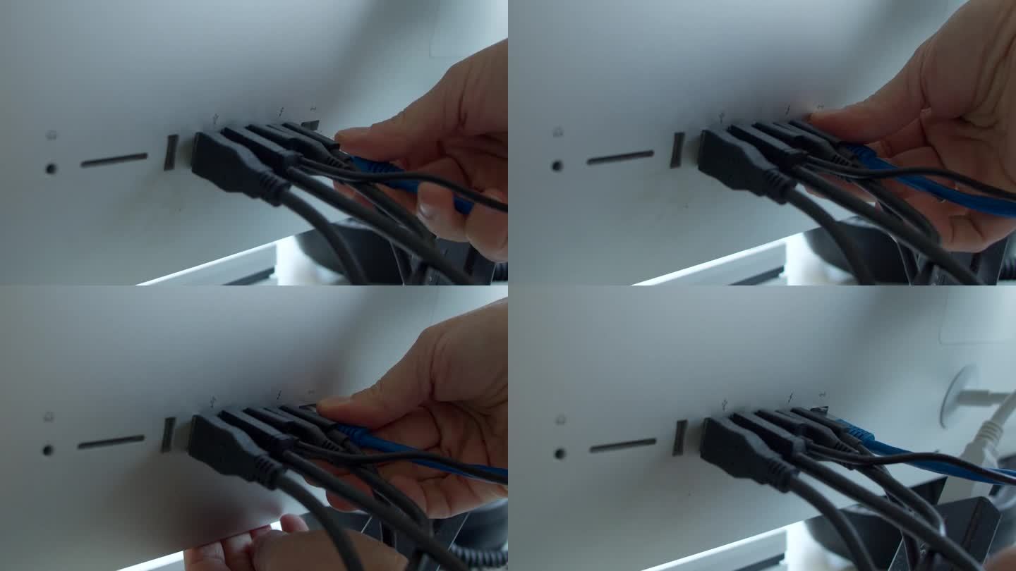 用手插入电脑的网络连接网线。慢动作