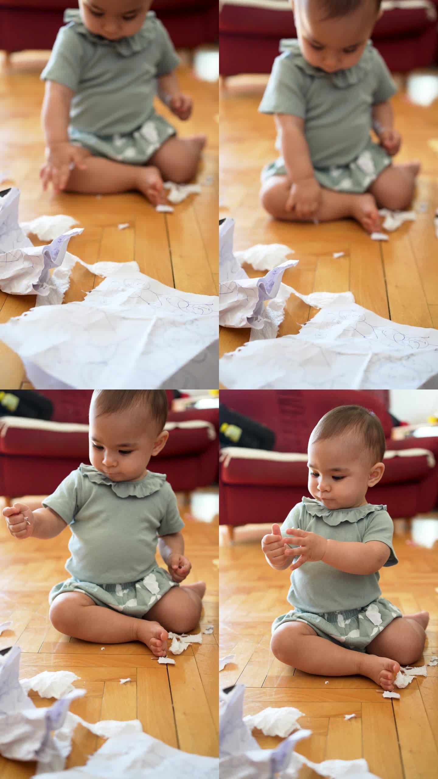 宝宝忙着撕纸