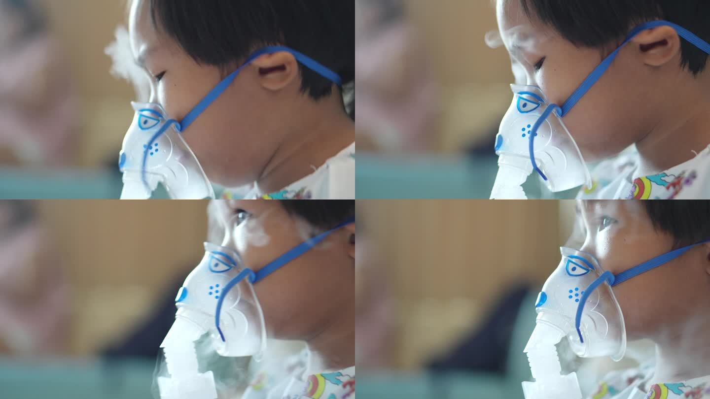 亚洲男孩坐在医院病床上，用吸入器治疗肺病。