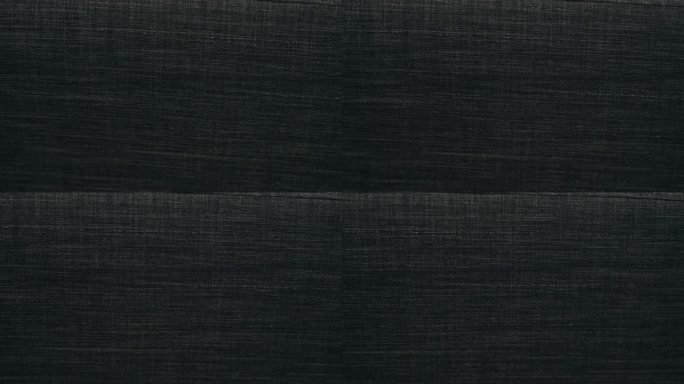 慢锅背景下降材料有机大黑灰色炭线聚酯棉羊毛沙发沙发手臂纹理柔软豪华温暖缝制合成材料