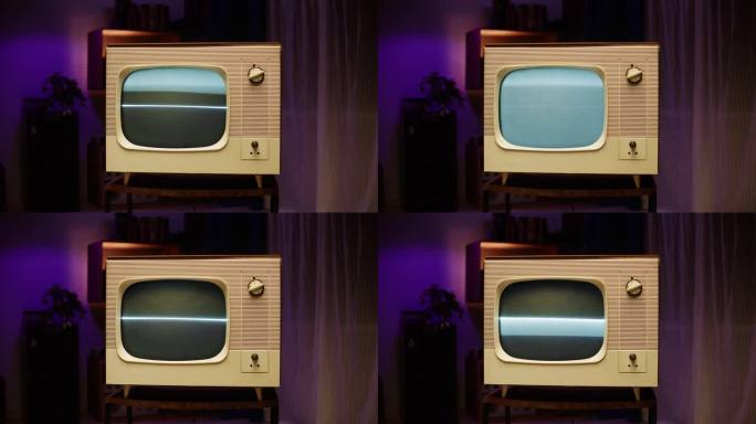 家里的旧电视屏幕是灰色的。客厅老式电视的特写，怀旧。搜索频道，信号不好。