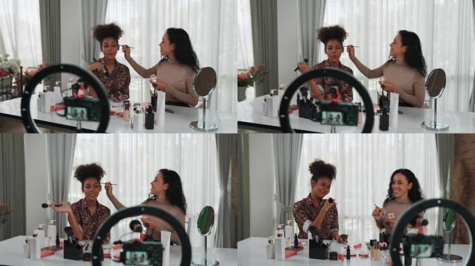 两名女性网红拍摄直播视频博客视频评论化妆至关重要的社会