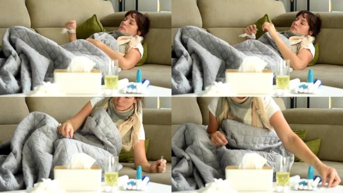 一位中年妇女躺在沙发上，发烧，发冷，有生病的迹象。
