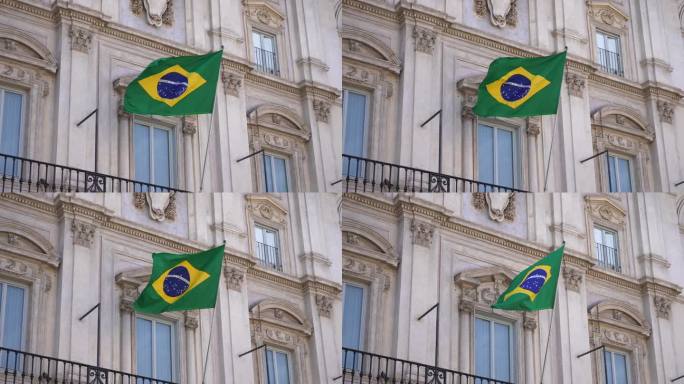 巴西驻罗马大使馆国旗飘扬的特写。该建筑是巴西领事馆所在地。旗杆上的巴西国旗在风中飘扬，没有人，没有人