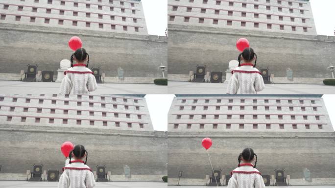 西安城墙永宁门小女孩气球红色2