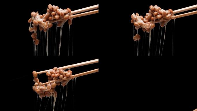 纳豆从筷子上掉下来的4K慢动作视频。