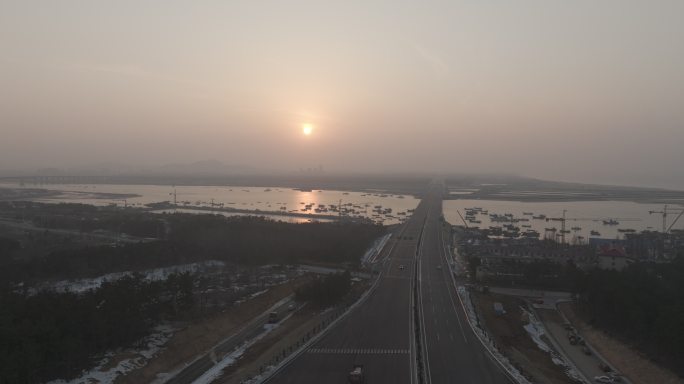 航拍威海双岛湾烟威高速双岛跨海大桥晚霞