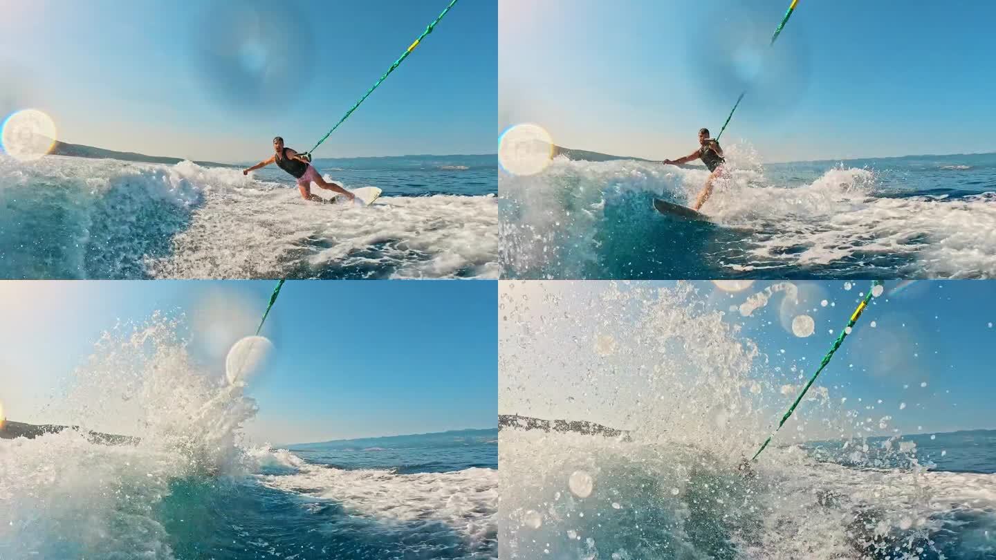 SLO MO男子冲浪与滑水板，在天空下的波浪上表演酷的动作